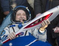 Олимпийский огонь вернулся из космоса на Землю