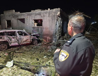 Через падение иранской ракеты в поселке Зарзир десятки пострадавших